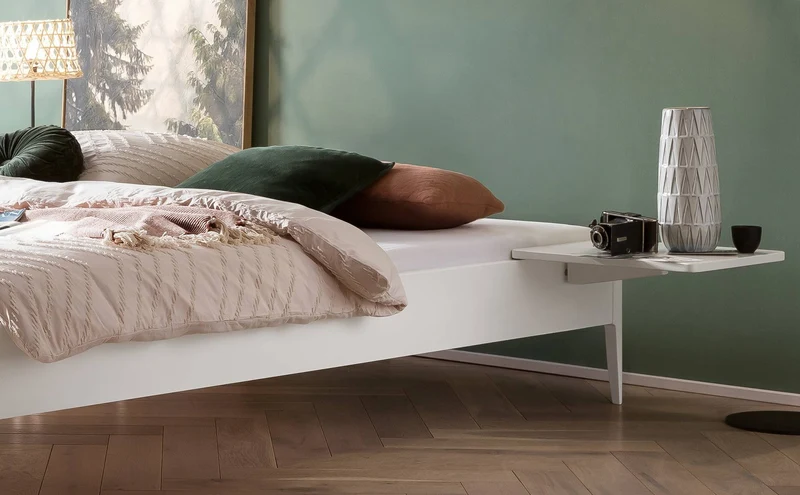 Hasena Bett Pieve Lounge Weiß lackiert mit schlanken Füßen und Rundprofil