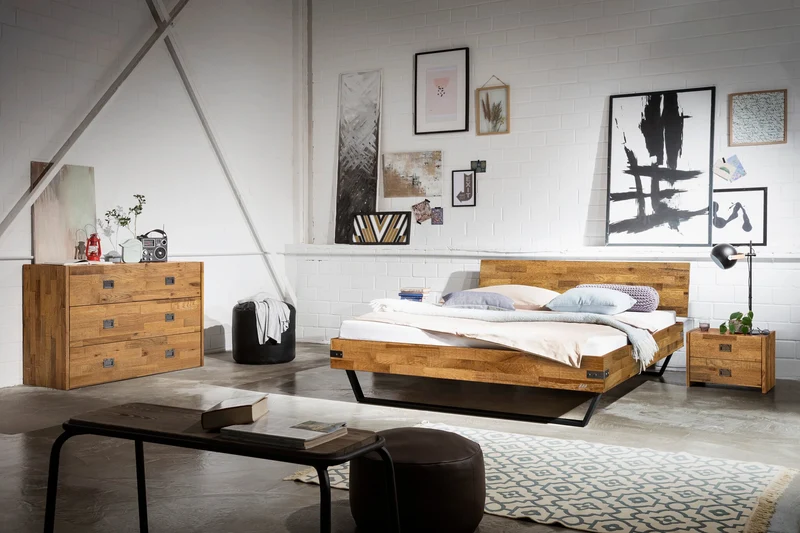 Hasena Bett Ezzo: Industrial-Loft-Design mit Akazie Massivholz und schwarzen Metall-Kufen