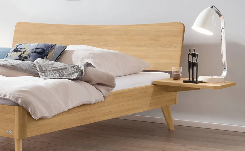 Hasena Caluso Massivholzbett Eiche bright geölt mit Loungestil-Design