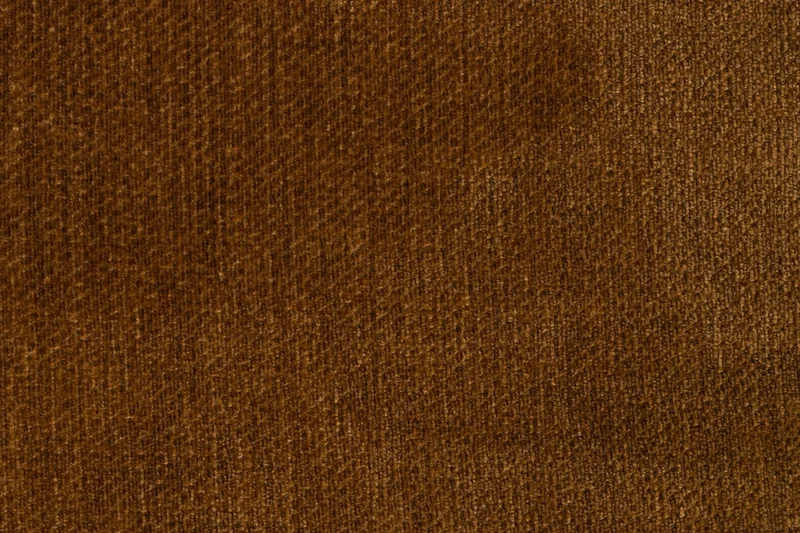 Loungesessel Radley Cognac von Dutchbone mit Samtbezug und Holzbeinen