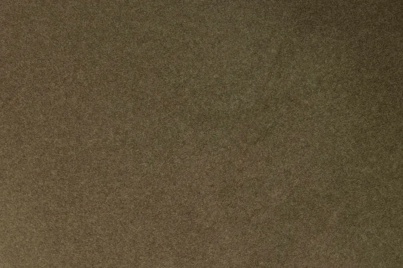 Hocker Marina Green mit Kontrastnaht, rundes Design fürs Wohnzimmer