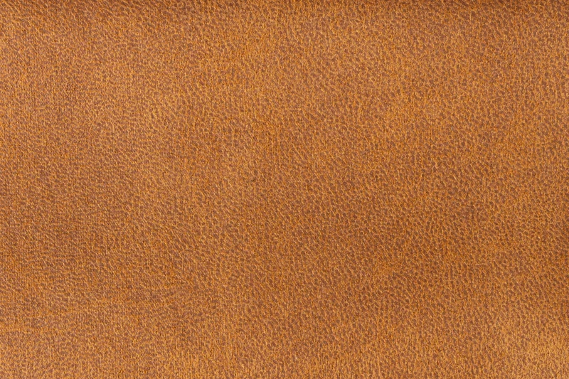 Hocker John in Cognac aus PU-Kunstleder mit stabilem Metallgestell